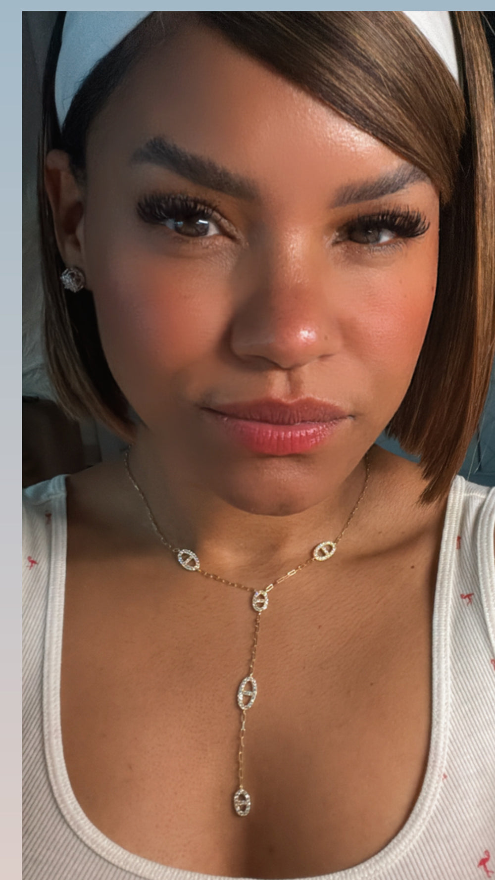 Oval Halo Necklace on a neutral background